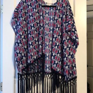 Cardigan with tassels on the bottom
